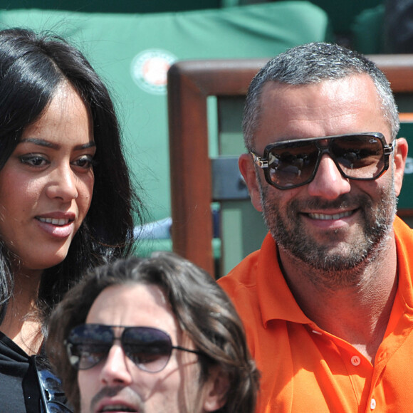 Amel Bent et son mari Patrick Antonelli - People aux Internationaux de France de tennis de Roland Garros à Paris, le 5 juin 2014. 