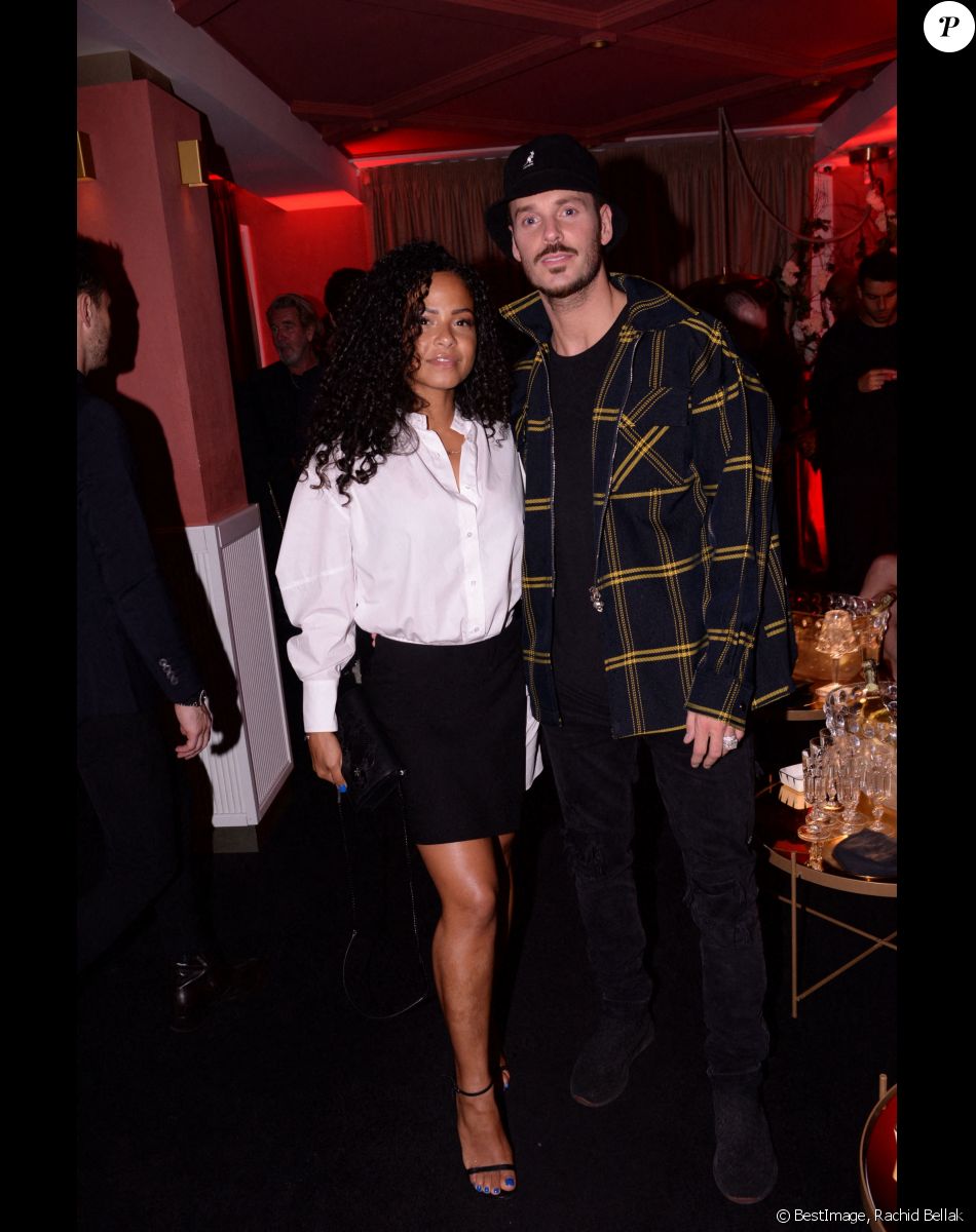 Matt Pokora et sa femme Christina Milian lors de la soirée d'anniversaire de Cindy Bruna (27 ans) au restaurant Giusé Trattoria à Paris, France, le 1er octobre 2021. Un événement organisé par Five Eyes Production. © Rachid Bellak/Bestimage