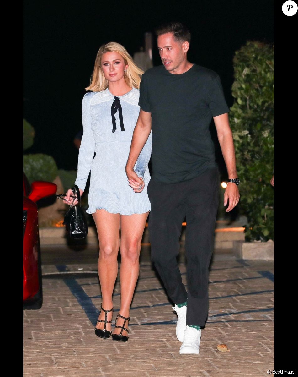 Paris Hilton et son fiancé Carter Reum vont dîner au restaurant "Nobu" à Los Angeles, le 3 juillet 2021.