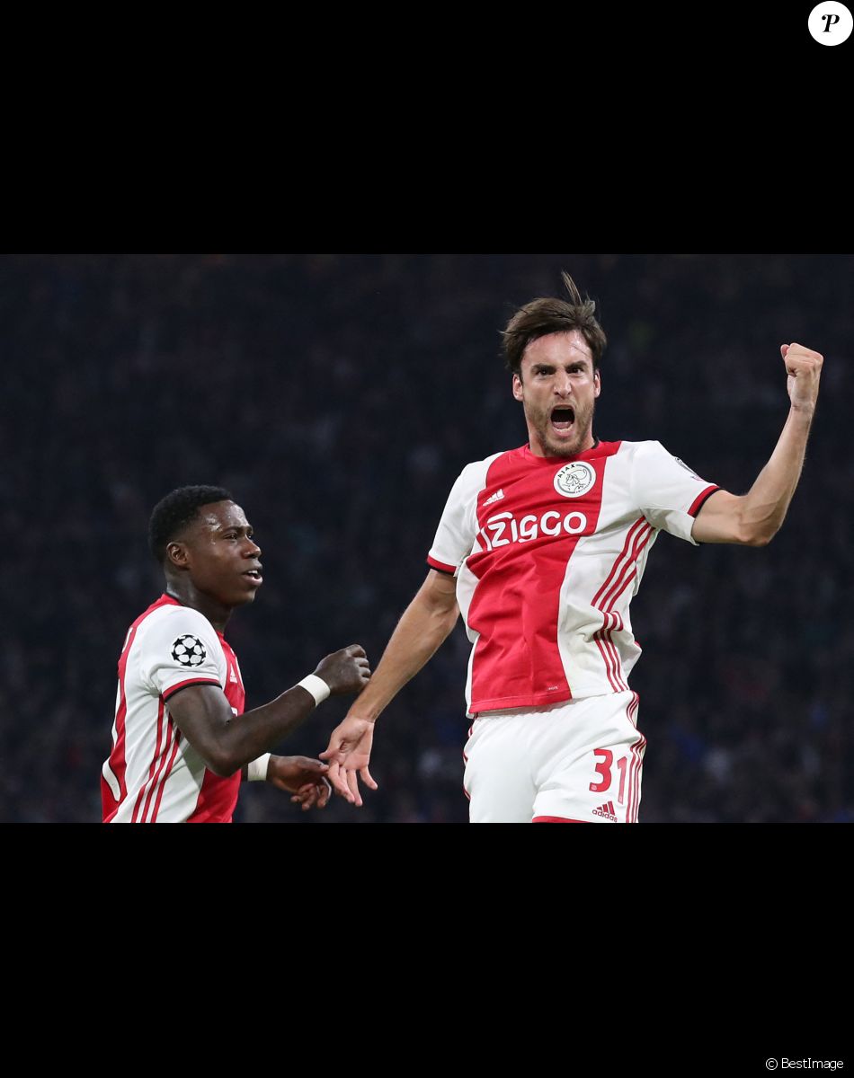 Quincy Promes (Ajax), Nico Tagliafico (Ajax) lors du match UEFA Ligue des Champions opposant l'Ajax Amsterdam au LOSC Lille au stade Johan Cruijff à Amsterdam, Pays-Bas, le 17 septembre 2019.