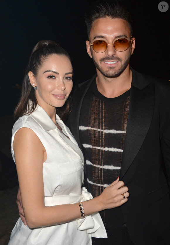 Nabilla Benattia (enceinte) et son mari Thomas Vergara au photocall de l'after party "Magnum x Rita Ora" sur la plage privée Magnum lors du 72ème Festival International du Film de Cannes, France,le 16 mai 2019. © Veeren/Bestimage