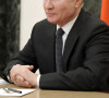 Le président russe Vladimir Poutine, quelques mois plus tôt, lors d'une réunion par vidéoconférence sur la sécurité de la Russie au Kremlin à Moscou, Russie le 26 février 2021.
