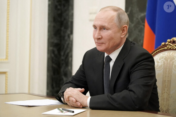 Le président russe Vladimir Poutine, quelques mois plus tôt, lors d'une réunion par vidéoconférence sur la sécurité de la Russie au Kremlin à Moscou, Russie le 26 février 2021.