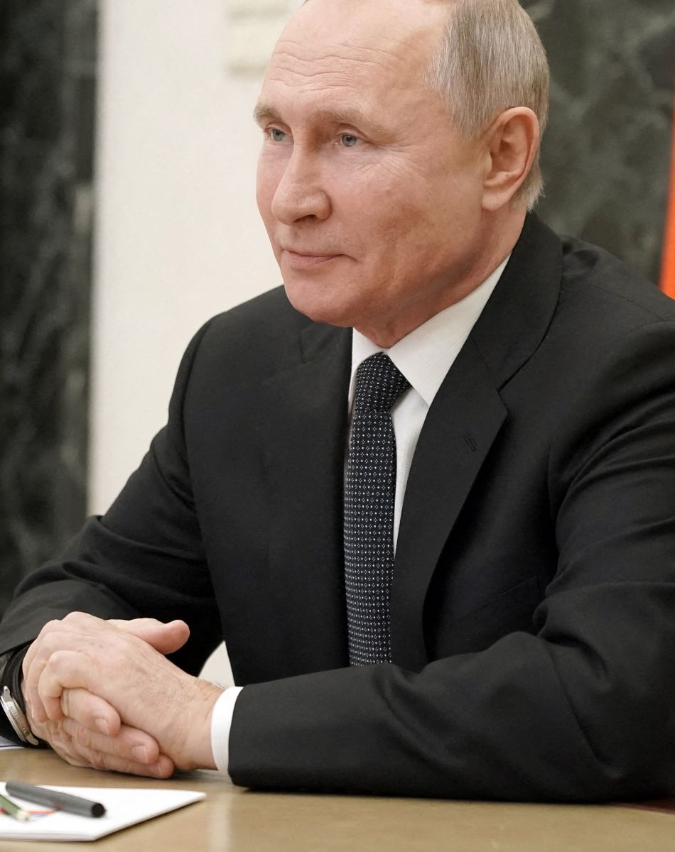 Le président russe Vladimir Poutine, quelques mois plus tôt, lors d'une réunion par vidéoconférence sur la sécurité de la Russie au Kremlin à Moscou, Russie le 26 février 2021.