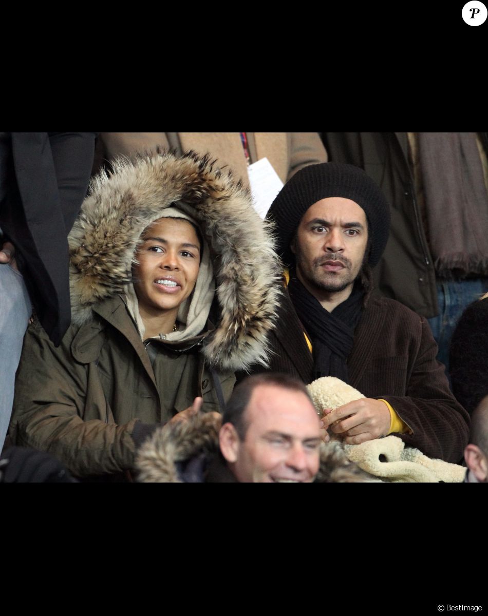 Ayo et Patrice dans les tribunes du Parc des princes en 2012.