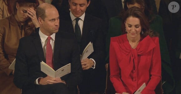 Le prince William, duc de Cambridge, et Kate Middleton, duchesse de Cambridge, assistent au Royal Christmas Concert à l'abbaye de Westminster à Londres, le 8 décembre 2021.