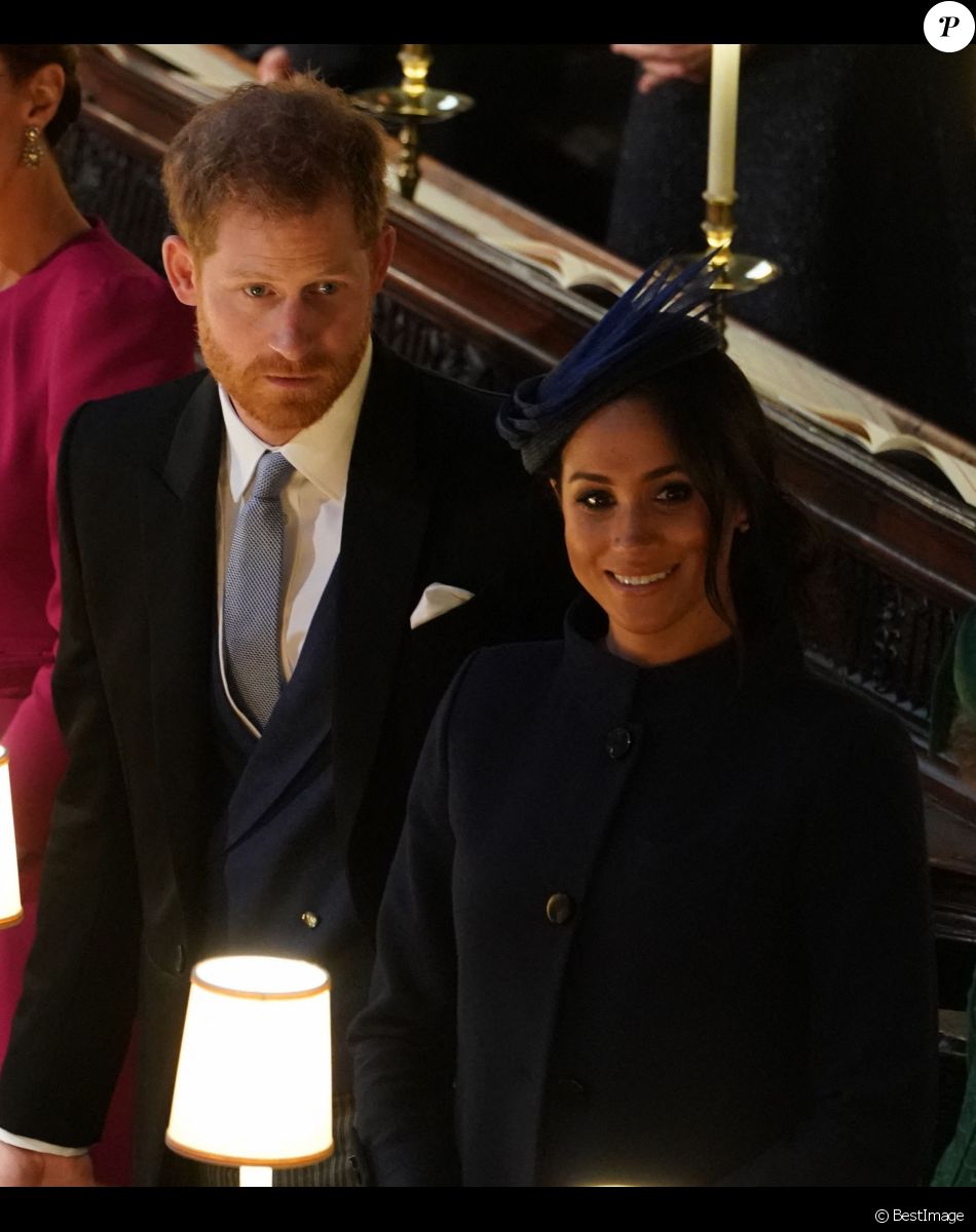 Le prince Harry, duc de Sussex, et Meghan Markle, duchesse de Sussex, à la cérémonie de mariage de la princesse Eugenie d'York et Jack Brooksbank en la chapelle Saint-George au château de Windsor, Royaume Uni le 12 octobre 2018.