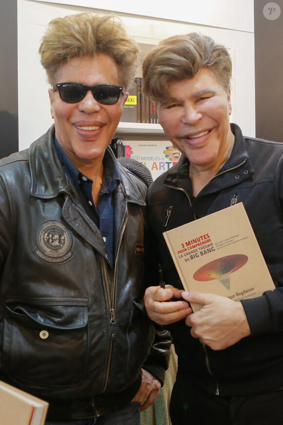 Les jumeaux Grichka et Igor Bogdanoff (Bogdanov) - Salon du livre à la porte de Versailles à Paris le 22 mars 2015.