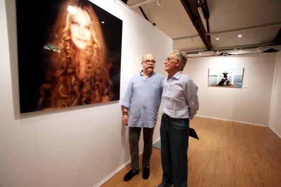 Gérard Schachmes et Bernard d'Ormale (mari de Brigitte Bardot) - Vernissage de l'exposition "Brigitte for Ever" du photographe Gérard Schachmes à Saint-Tropez le 25 juillet 2014.