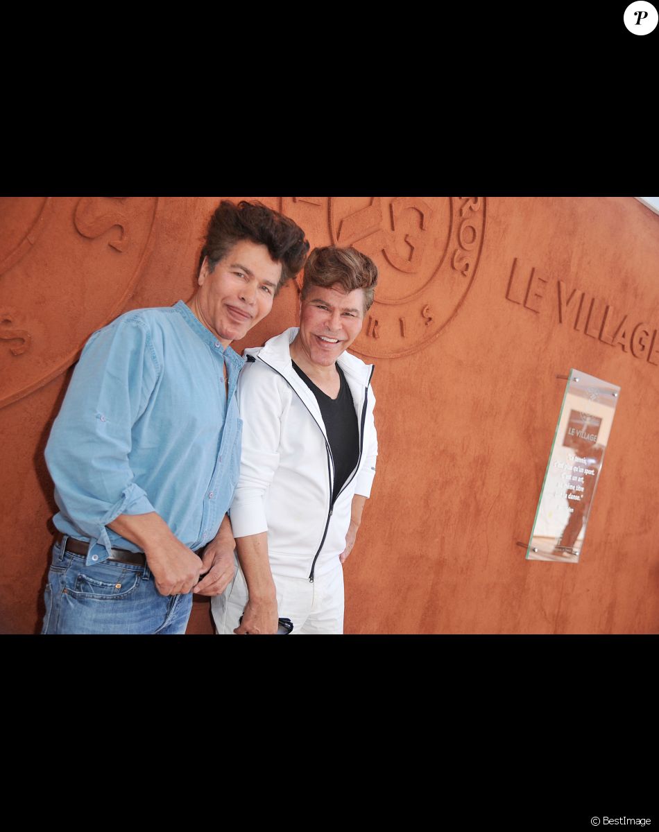 Igor et Grichka Bogdanov au village des Internationaux de France de tennis de Roland-Garros à Paris, le 6 juin 2014.