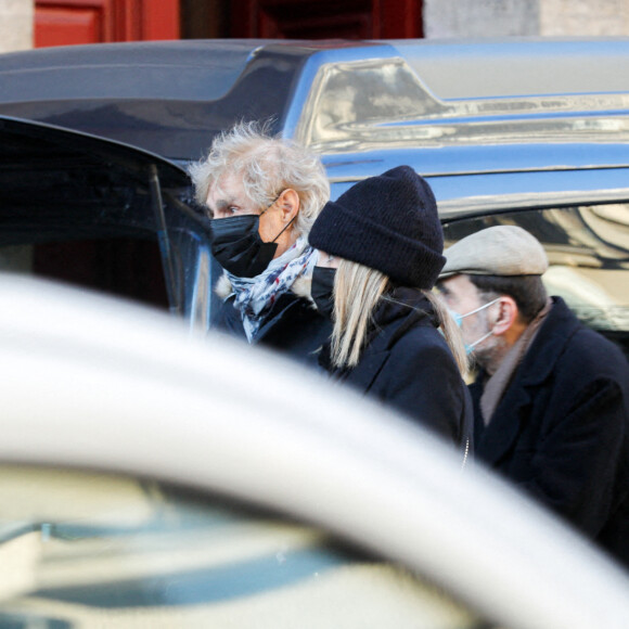 Exclusif - Louis Bertignac et sa femme Laetitia Brichet aux obsèques de Gérard Drouot en l'église Saint-Jacques du Haut-Pas à Paris, France, le 14 janvier 2022.