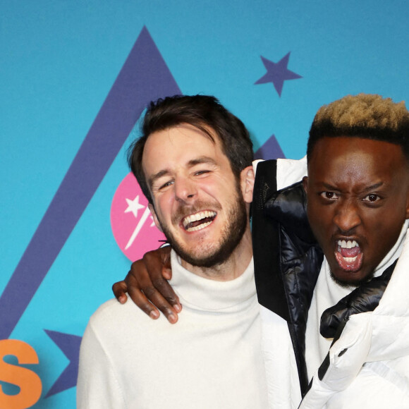 Bertrand Usclat et Ahmed Sylla - Photocall de la soirée lors de la 25ème édition du Festival international du film de comédie de l'Alpe d'Huez le 20 janvier 2022 © Dominique Jacovides / Bestimage