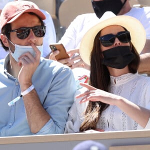 Vianney et sa compagne Catherine Robert (enceinte) dans les tribunes lors de la finale des internationaux de France Roland Garros à Paris le 13 juin 2021. © Dominique Jacovides / Bestimage 