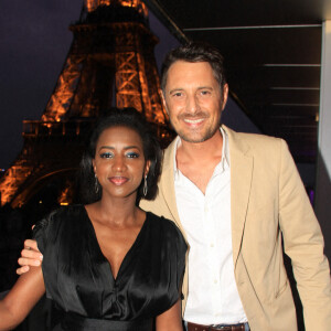 Exclusif - Hapsatou Sy et son mari Vincent Cerruti - Le Grand Dîner du 14 juillet, sur le rooftop de l'hôtel Pullman Tour Eiffel à Paris, France, le 14 juillet 2021. © Philippe Baldini/Bestimage