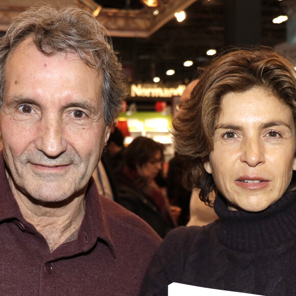 Jean-Jacques Bourdin et sa femme Anne Nivat - 38e salon du livre de Paris à la Porte de Versailles, Paris le 17 mars 2018. © Cédric Perrin/Bestimage