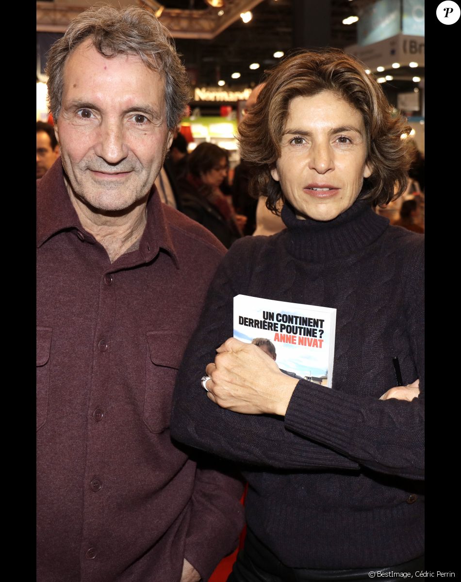 Jean-Jacques Bourdin et sa femme Anne Nivat - 38e salon du livre de Paris à la Porte de Versailles, Paris le 17 mars 2018. © Cédric Perrin/Bestimage