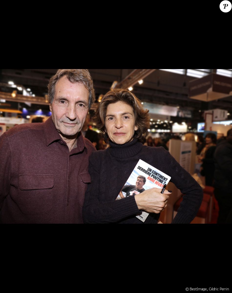 Anne Nivat et son mari Jean-Jacques Bourdin - Salon du livre à la porte de Versailles à Paris le 18 mars 2018. © Cédric Perrin/Bestimage