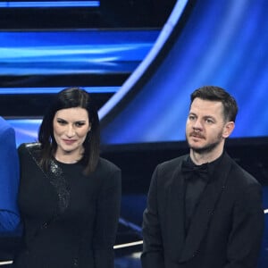 Mika, Laura Pausini, Alessandro Cattelan sur la scène du 72ème Festival de la chanson italienne de Sanremo. Le 2 février 2022 