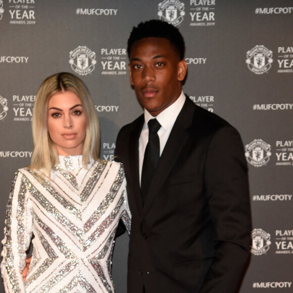 Anthony Martial et sa femme Mélanie Da Cruz lors de la soirée du prix du joueur de l'année de Manchester United 2019 au stade Old Trafford à Manchester, Royaume Uni, le 9 mai 2019.