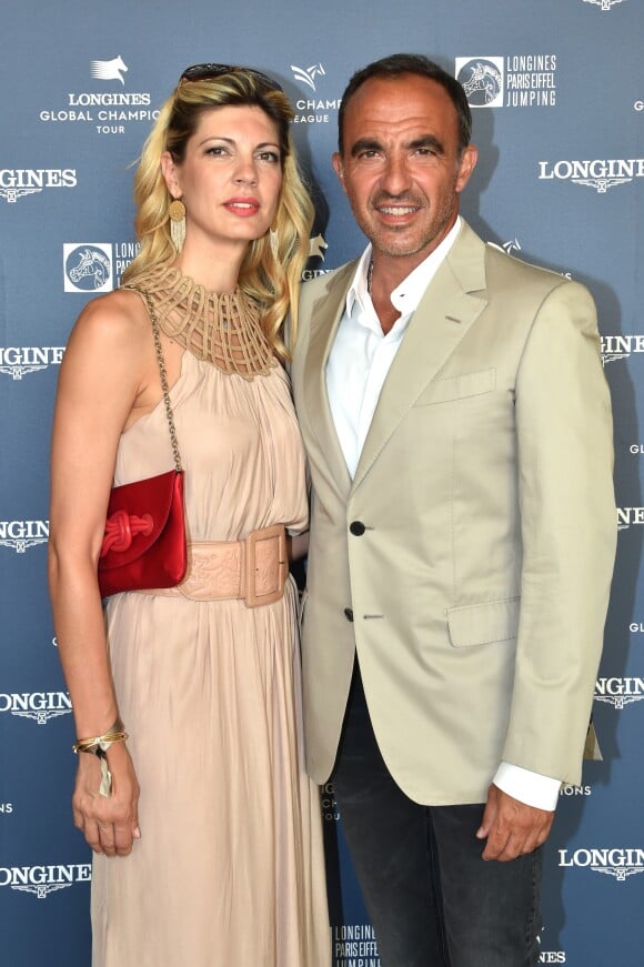 Exclusif - Nikos Aliagas et sa compagne Tina Grigoriou - Photocall du Longines Paris Eiffel Jumping au Champ de Mars à Paris le 7 juillet 2018. ©Veeren-Perusseau/Bestimage