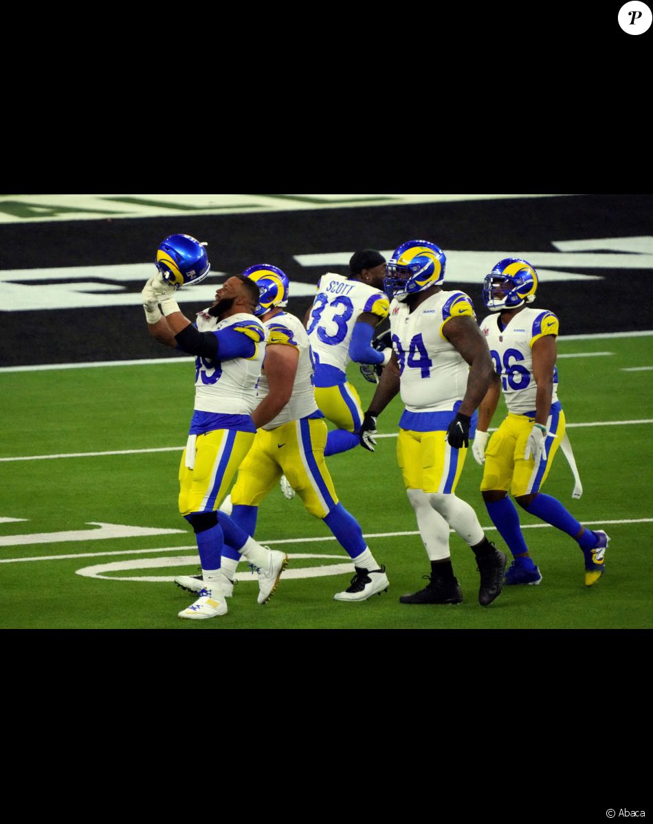 Los Angeles Rams defensive end Aaron Donald (99) celebrates with teammates after defeating the Cincinnati Bengals in Super Bowl LVI at SoFi Stadium.Los Angeles, CA, USA, February 13, 2022. Photo Kirby Lee-USA Today Sports/SPUS/ABACAPRESS.COM