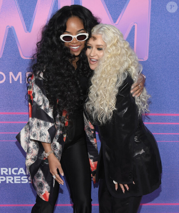 H.E.R. et Christina Aguilera assistent à la soirée Billboard Women in Music au YouTube Theater. Inglewood, Los Angeles, le 2 mars 2022.