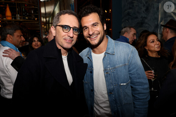 Gad Elmaleh et le chanteur Amir - After de l'avant-première du film "Maison de retraite" à Paris le 10 février 2022. © Rubens Hazon/Bestimage