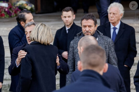 Nicolas Sarkozy, Bernard Montiel - Sorties des obsèques de Jean-Pierre Pernaut en la Basilique Sainte-Clotilde à Paris le 9 mars 2022. © Cyril Moreau/Bestimage