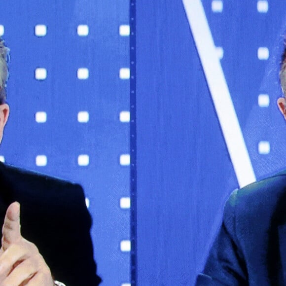 Débat télévisé entre le leader du mouvement de gauche français La France Insoumise (LFI) et candidat à l'élection présidentielle Jean-Luc Mélenchon et le journaliste d'extrême droite français Eric Zemmour, dans les studios de la chaîne française d'information en continu BFMTV, avant l'élection présidentielle française de 2022, Paris, France, le 23 septembre 2021.