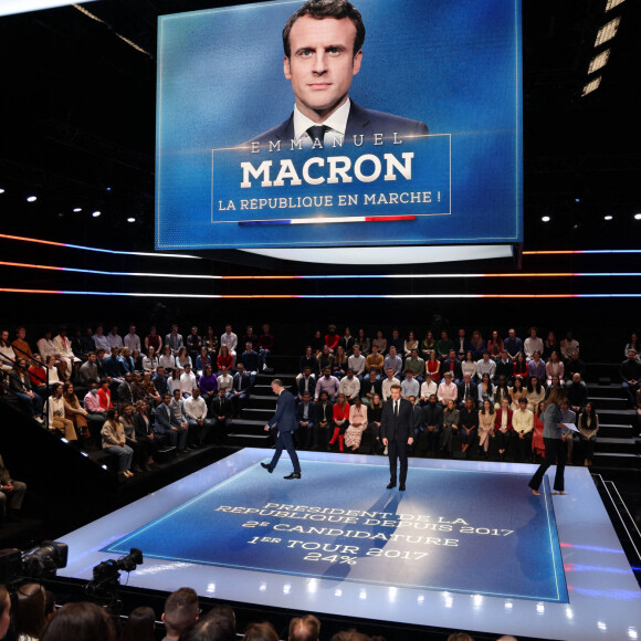 Le président Emmanuel Macron - Les candidats à l'élection présidentielle sont sur le plateau de l'émission "La France face à la guerre" sur TF1 le 14 mars 2022.