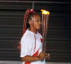 La joueuse de tennis Naomi Osaka allume le chaudron olympique lors de la cérémonie d'ouverture des JO Tokyo.