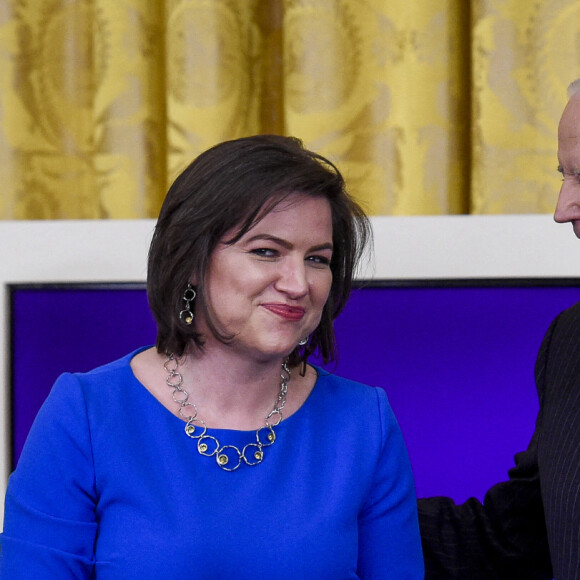 Joe Biden reçoit des participants à la Maison Blanche, en compagnie de sa femme Jill, dans le cadre de l'évènement Equal Pay Day, le 15 mars 2022, à Washington.