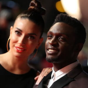Corneille et sa femme Sofia de Medeiros - 16e édition des NRJ Music Awards à Cannes. Le 13 décembre 2014.
