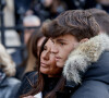 Nathalie Marquay et son fils Tom - La famille de Jean-Pierre Pernaut à la sortie des obsèques en la Basilique Sainte-Clotilde à Paris le 9 mars 2022. © Cyril Moreau/Bestimage