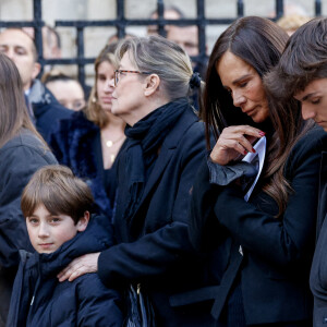 Nathalie Marquay et son fils Tom - La famille de Jean-Pierre Pernaut à la sortie des obsèques en la Basilique Sainte-Clotilde à Paris le 9 mars 2022. © Cyril Moreau/Bestimage