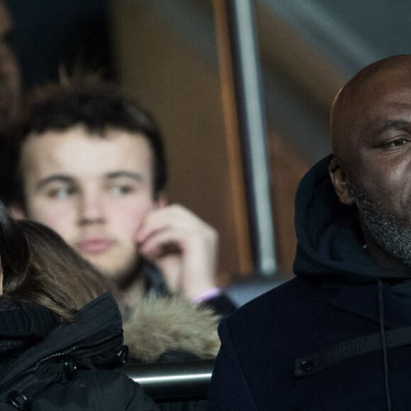 Fayza Lamari et Wilfried Mbappé (parents de Kylian Mbappé) dans les tribunes lors du match de Champions League "PSG - Galatasaray (5-0)" au Parc des Princes à Paris, le 11 décembre 2019. © Cyril Moreau/Bestimage