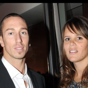 Frédérick Bousquet et Laure Manaudou lors du dîner de gala de la mode contre le Sida au Pavillon d'Armenonville en 2010.