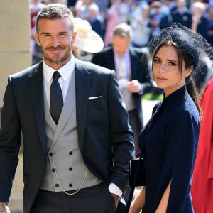 David Beckham et sa femme Victoria - Les invités arrivent à la chapelle St. George pour le mariage du prince Harry et de Meghan Markle au château de Windsor, Royaume Uni.