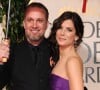 Jesse James et Sandra Bullock arriving aux Golden Globe Awards à Los Angeles
