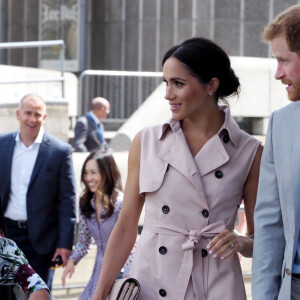 Le prince Harry, duc de Sussex et sa femme Meghan Markle, duchesse de Sussex, arrivent à l'exposition commémorative du centenaire de la naissance de Nelson Mandela au centre Southbank à Londres le 17 juillet 2018
