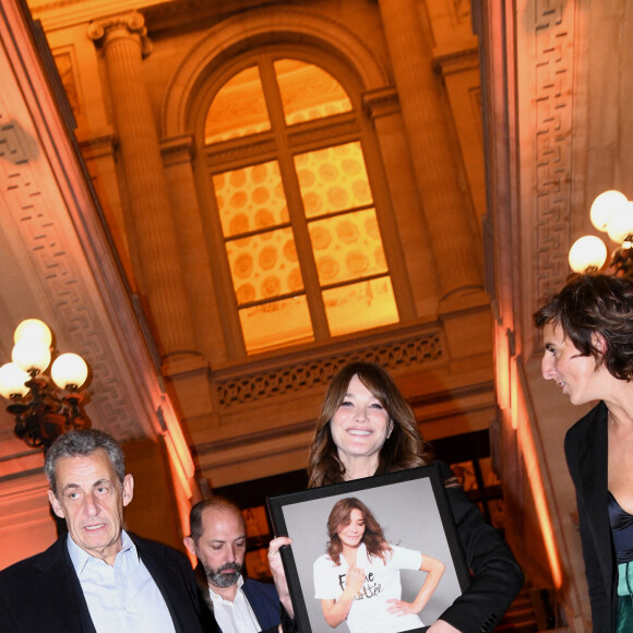 Nicolas Sarkozy et sa femme Carla Bruni-Sarkozy - Dîner des "Femmes Culottées" Etam au Musée de la Monnaie à Paris le 22 mars 2022. © Rachid Bellak/Bestimage 