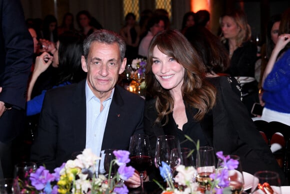 Nicolas Sarkozy et sa femme Carla Bruni-Sarkozy - Dîner des "Femmes Culottées" Etam au Musée de la Monnaie à Paris le 22 mars 2022.  © Rachid Bellak/Bestimage 