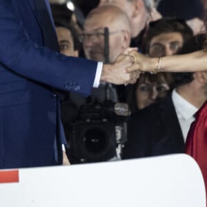 Le président Emmanuel Macron et la chanteuse Farrah El-Dibany - Le président Emmanuel Macron prononce un discours au Champ de Mars le soir de sa victoire à l'élection présidentielle le 24 avril 2022