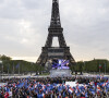 Illustration Tour Eiffel - Le président Emmanuel Macron prononce un discours au Champ de Mars le soir de sa victoire à l'élection présidentielle le 24 avril 2022.
