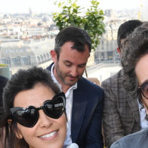 Exclusif - Reem Kherici et son mari Gilles Lemaire - Soirée de lancement de la gamme de boissons "Drink Waters" au restaurant Créatures sur le rooftop des Galeries Lafayette à Paris le 9 mai 2022. © Clovis-Bellak/Bestimage 