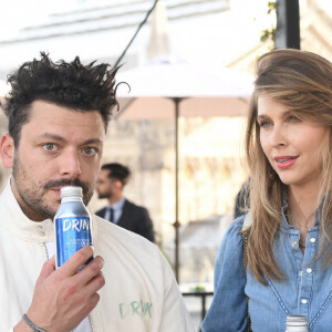 Exclusif - Kev Adams, Ophélie Meunier - Soirée de lancement de la gamme de boissons "Drink Waters" au restaurant Créatures sur le rooftop des Galeries Lafayette à Paris le 9 mai 2022. © Clovis-Bellak/Bestimage 