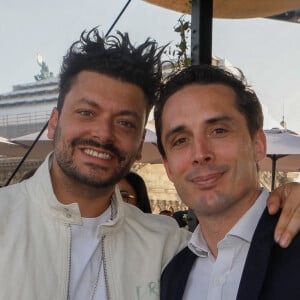 Exclusif - Kev Adams, Jean-Baptiste Djebbari (ministre chargé des transports) - Soirée de lancement de la gamme de boissons "Drink Waters" au restaurant Créatures sur le rooftop des Galeries Lafayette à Paris le 9 mai 2022. © Clovis-Bellak/Bestimage 