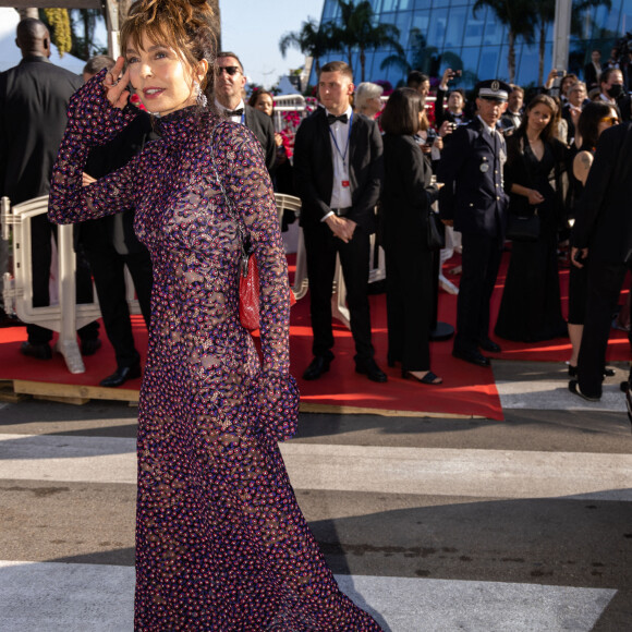 Exclusif - Anne Parillaud - Arrivées des célébrités à bord des voitures officielles pour la montée des marches du film "Coupez !" à l'occasion de la cérémonie d'ouverture du 75ème Festival International du Film de Cannes le 17 mai 2022.