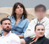 Estelle Denis et son fils Merlin Domenech - People des les tribunes des Internationaux de France de Tennis de Roland Garros 2022 - Jour 1. à Paris le 22 mai 2022.