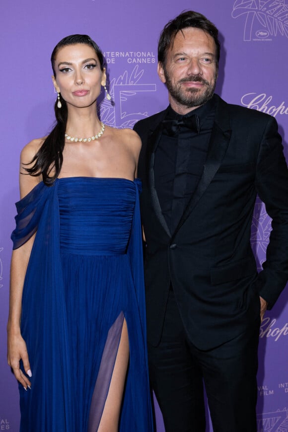 Stefania Cristian et son compagnon Samuel Le Bihan - Photocall du dîner du 75ème Festival International du Film de Cannes. Le 24 mai 2022